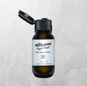 Milkman razor rail shave oil bottle with dripolator lid