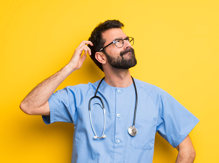 bearded doctor scratching head at beard myths